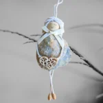 Best Handmade Shell Angel Ornament made of seashell, wooden heart and white bow.